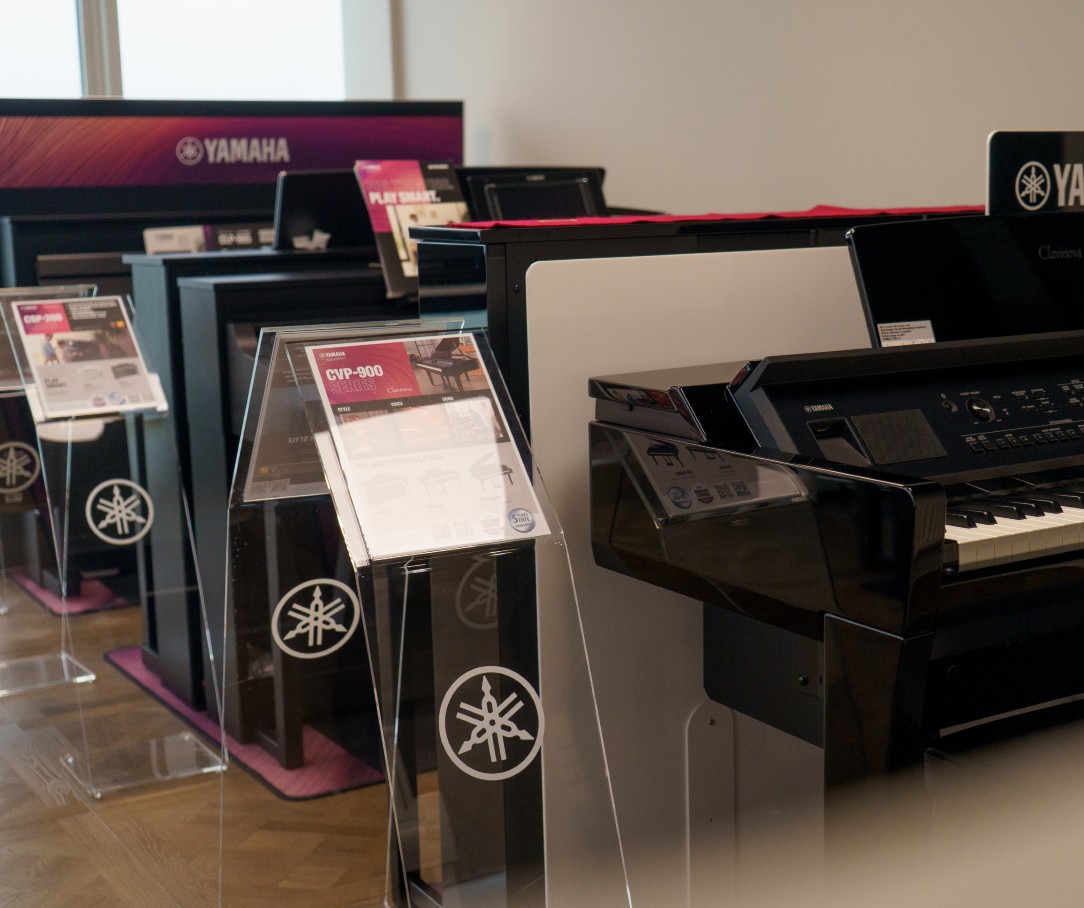 The Music Station digital piano area inside the Swansea showroom